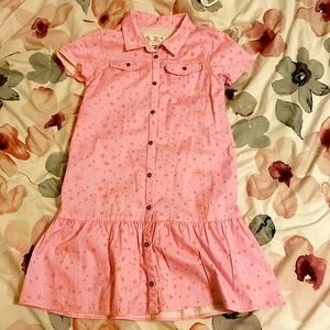 A hot pink dress that is perfect for the summer or any cute day.